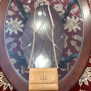 Tory Burch crossbody bag, beautiful color can go with any creams or whites.